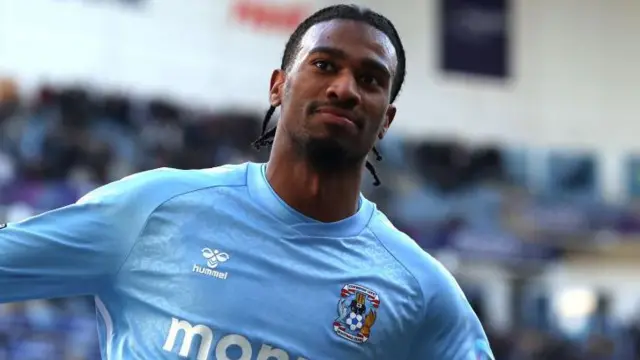 Coventry City's Haji Wright celebrating with his arms out wide after scoring