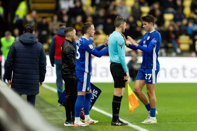 David Turnbull acknowledges Rubin Collwill as he prepares to replace him at Watford