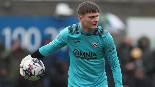 Archie Mair of Morecambe is playing in the Sky Bet League 2 match between Morecambe and Barrow at the Globe Arena in Morecambe