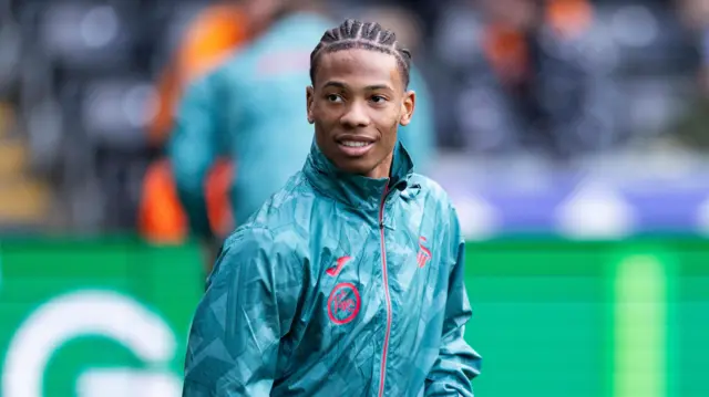 Ishe Samuels-Smith warms up for a Swansea game