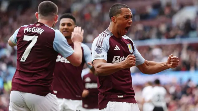 Villa players celebrate