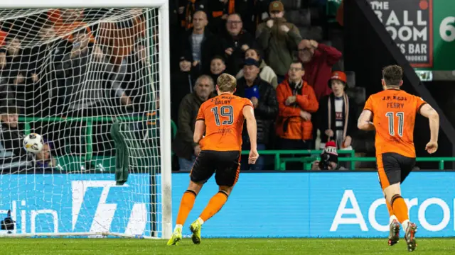 Sam Dalby celebrates after scoring his penalty