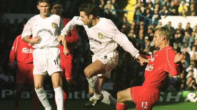 Mark Viduka of Leeds gets past Sami Hyypia of Liverpool during the match between Leeds United and Liverpool 