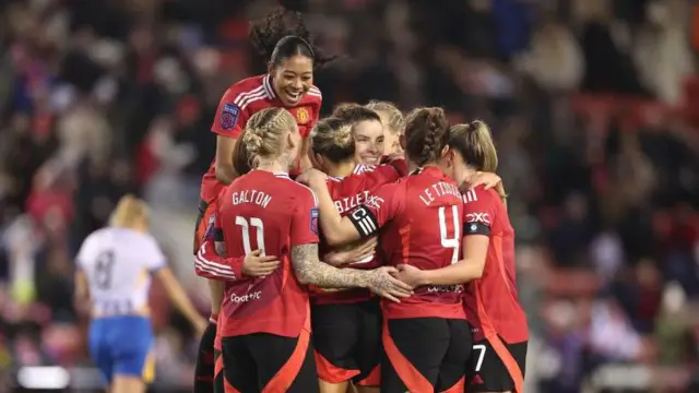 Manchester United celebrating their 3-0 win over Brighton.