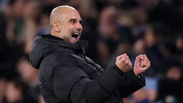 Pep Guardiola celebrates
