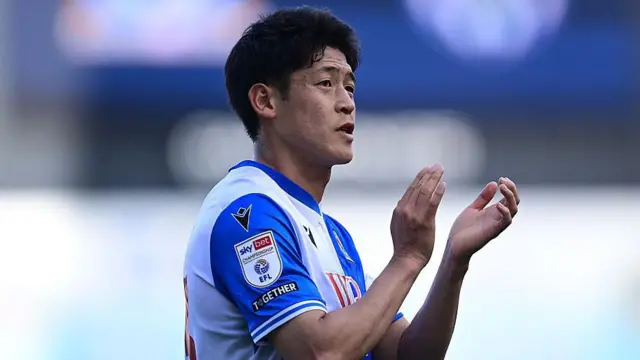 Blackburn Rovers' Yuki Ohashi applauds the fans