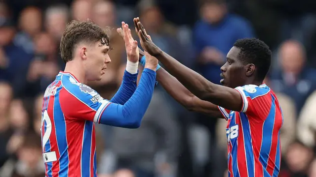 Ismaila Sarr of Crystal Palace celebrates scoring his team's first goal with teammate Jorgen Strand Larsen