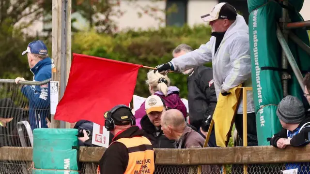 Red flags being shown at the Cookstown 100