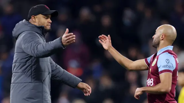 Vincent Kompany and Nathan Redmond celebrate