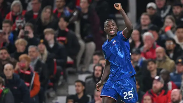 Moises Caicedo celebrates a goal for Chelsea