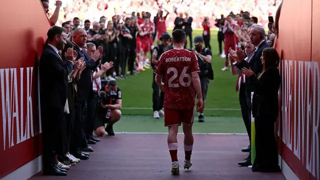 Andy Robertson walks out to a guard of honour 