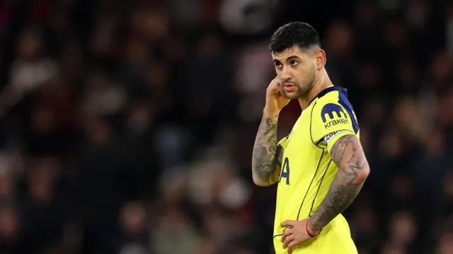 Cristian Romero looks on thoughtfully during match