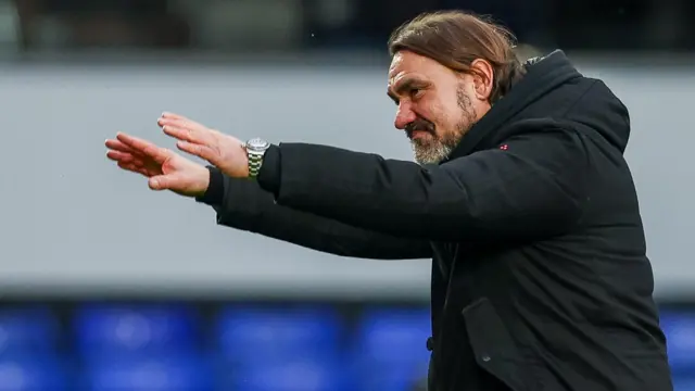 Daniel Farke holds his hands out towards the crowd after Leeds game at Birmingham City