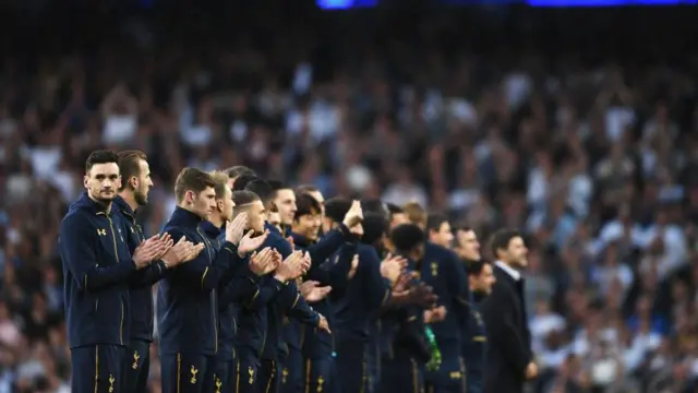 Hugo Lloris and the rest of the Tottenham squad applaud the crowd after Tottenham's final game at White Hart Lane