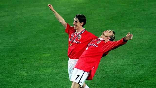 Gary Neville and David Beckham of Manchester United celebrate after winning the 1999 Champions League final