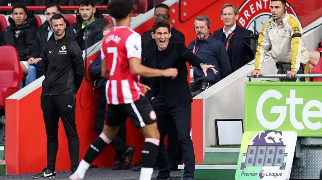 Keith Andrews shouts at his players from the touchline