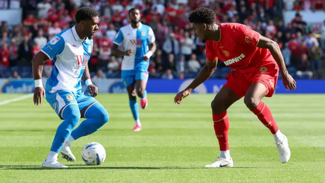 Blackburn Rovers' Jayden Fevrier is put under pressure by Middlesbrough's Adilson Malanda during their Championship game on Saturday.