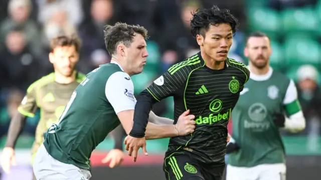 Hibernian's Josh Mulligan and Celtic's Reo Hatate
