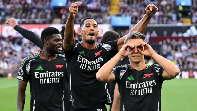 Leandro Trossard, William Saliba and Thomas Partey wearing Arsenal's away kit during the win at Aston Villa