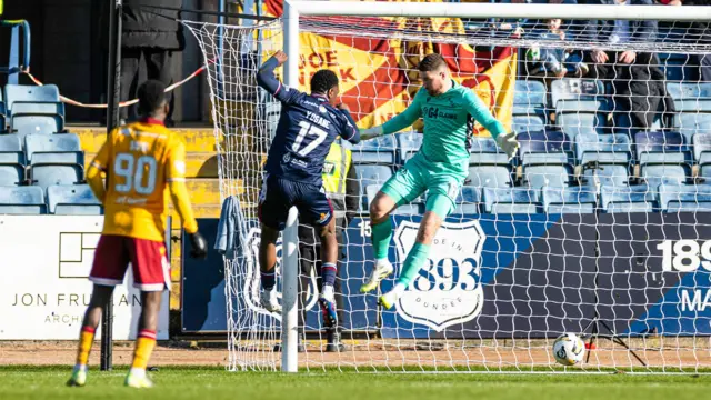 Tony Yogane scored the opening goal in Dundee's 2-1 win over Motherwell