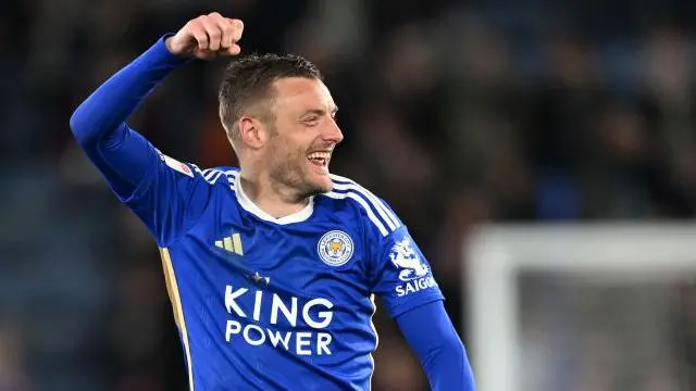 Jamie Vardy smiles while in action for Leicester