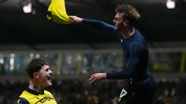 Oxford United celebrate scoring late against Southampton