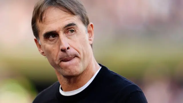 Julen Lopetegui looks on