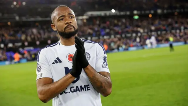 Jordan Ayew of Leicester City applauds the travelling Leicester City fans after the Premier League match between Ipswich Town and Leicester City at Portman Road