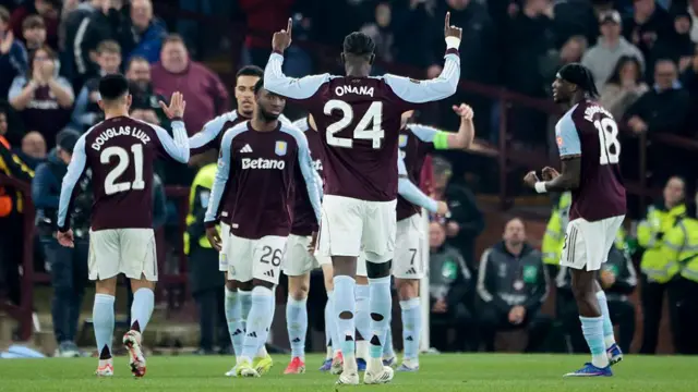 Amadou Onana of Aston Villa and teammates celebrate