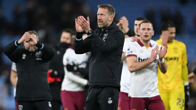 Graham Potter applauds the West Ham after the final whistle