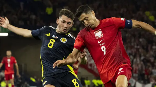 Scotland's Billy Gilmour and Poland's Robert Lewandowski 