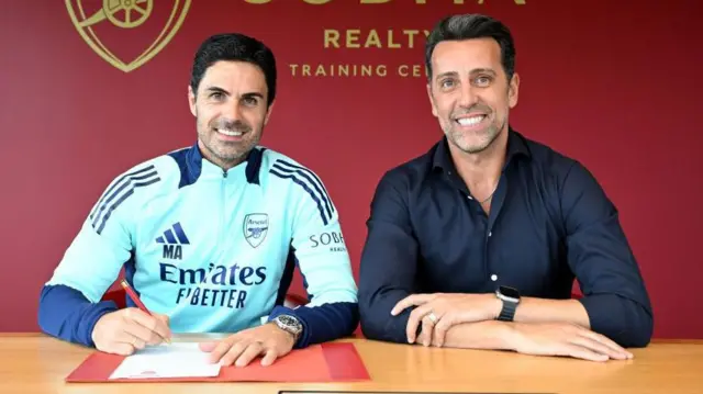 Arsenal manager Mikel Arteta sits with Edu