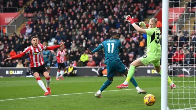 Dango Ouattara of AFC Bournemouth scores past Aaron Ramsdale