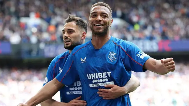 Rangers' Cyriel Dessers (right) celebrates his goal