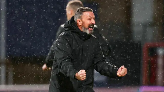 Derek McInnes celebrates