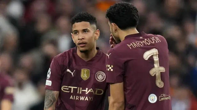 Savinho and Omar Marmoush talk to each other