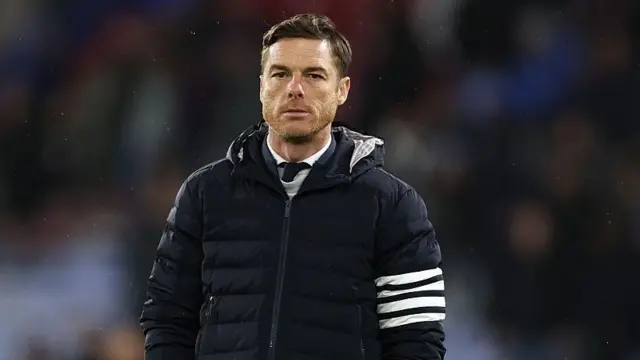 Scott Parker in a puffy black coat 