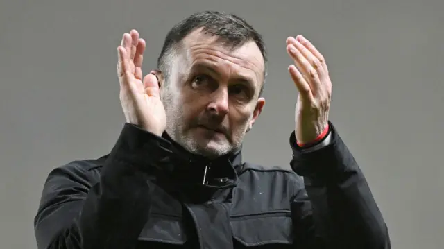 Nathan Jones clapping