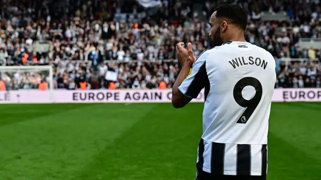 Callum Wilson applauds fans at St James' Park