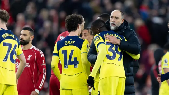 Igor Tudor hugs players after draw with Liverpool