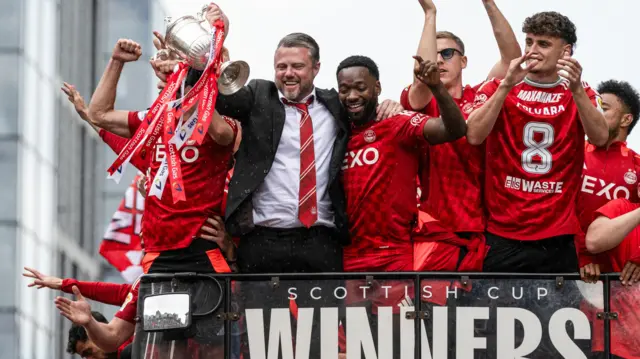 Aberdeen Manager Jimmy Thelin and Shayden Morris are pictured leading the celebrations during the Aberdeen bus parade to celebrate winning the Scottish Gas Scottish Cup