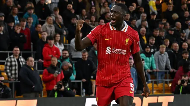 Ibrahima Konate of Liverpool celebrates scoring the first goal during the Premier League match between Wolverhampton Wanderers FC and Liverpool FC at Molineux