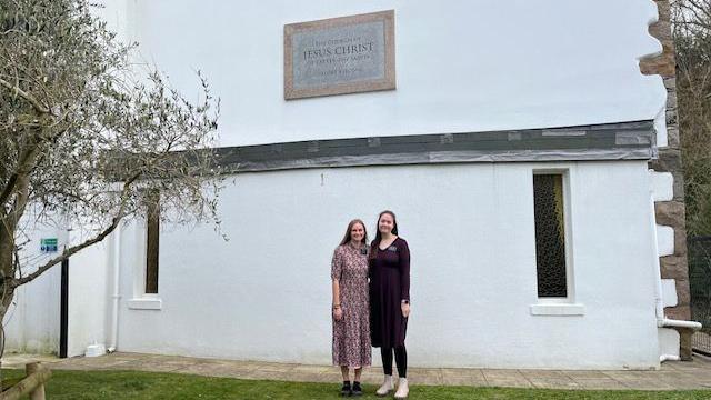 two women outside church 