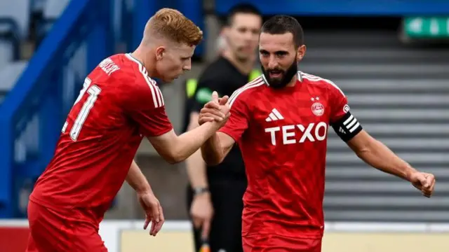 Aberdeen captain Graeme Shinnie was on target in Dumfries