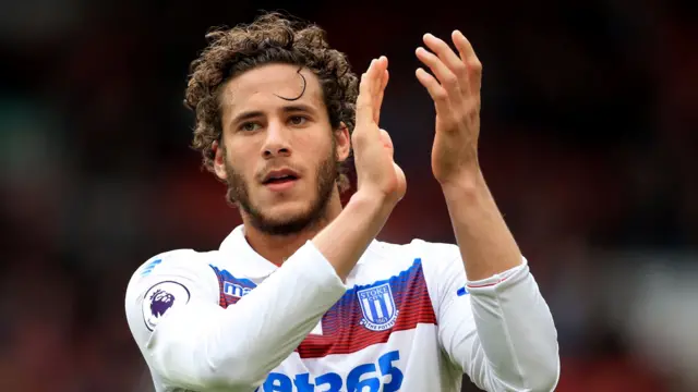 Stoke City forward, Ramadan Sobhi applauds the Stoke fans