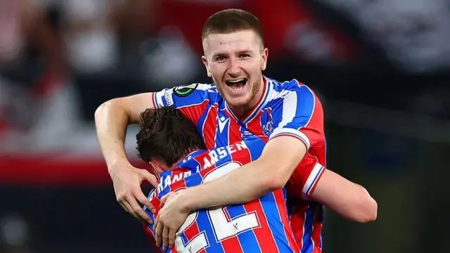 Adam Wharton of Crystal Palace celebrates with team-mate Jorgen Strand Larsen