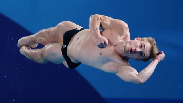 Jack Laugher dives in the men's 3m springboard semi-finals