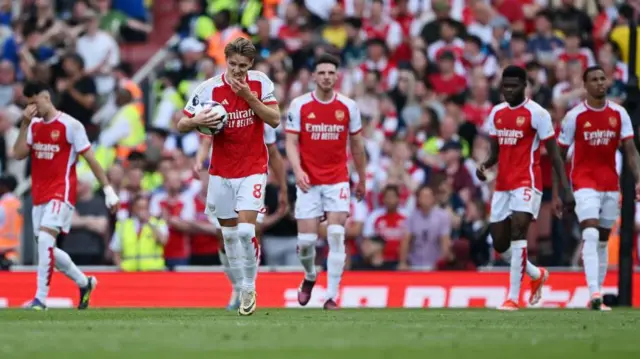 Arsenal players dejected