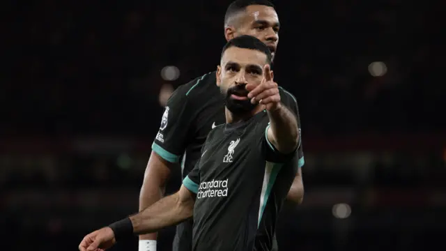 Mohamed Salah celebrates a goal for Liverpool against Arsenal