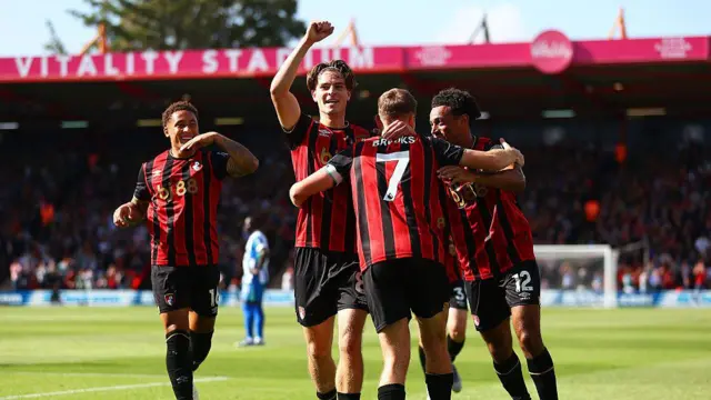 Alex Scott of AFC Bournemouth celebrates scoring his team's first goal with teammate David Brooks